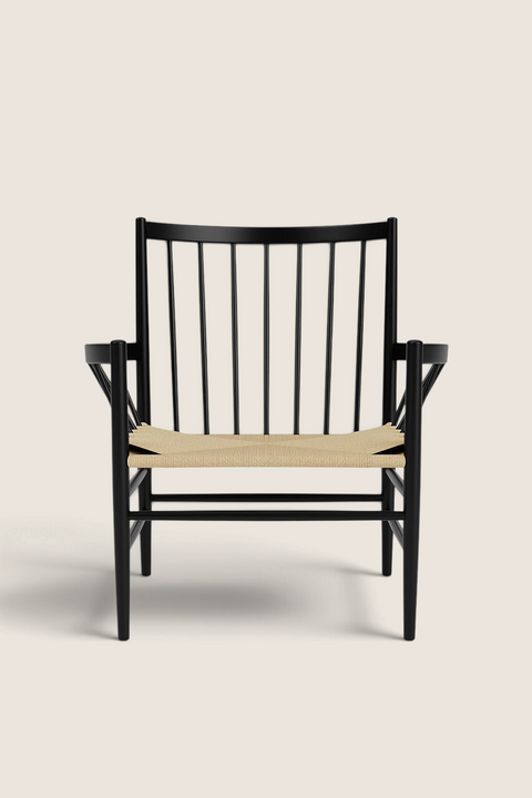 Bolina J82 lounge chair in black beech wood with a natural paper cord woven seat, featuring a classic Danish design.