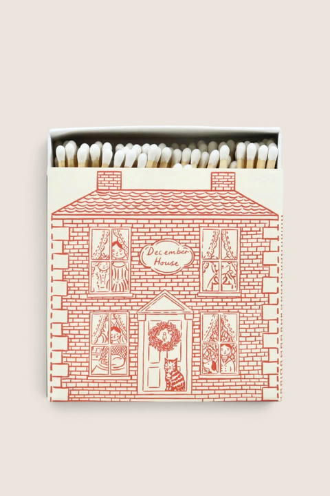 Bolina December House decorative matchbox with red line art illustration of a cozy home on a cream background