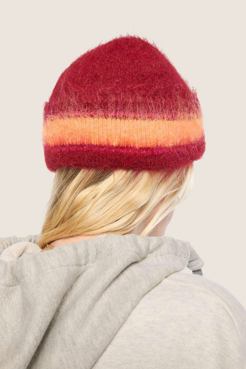 Bolina MOTHER brushed wool blend beanie in red, orange, and hot pink stripes worn from the back