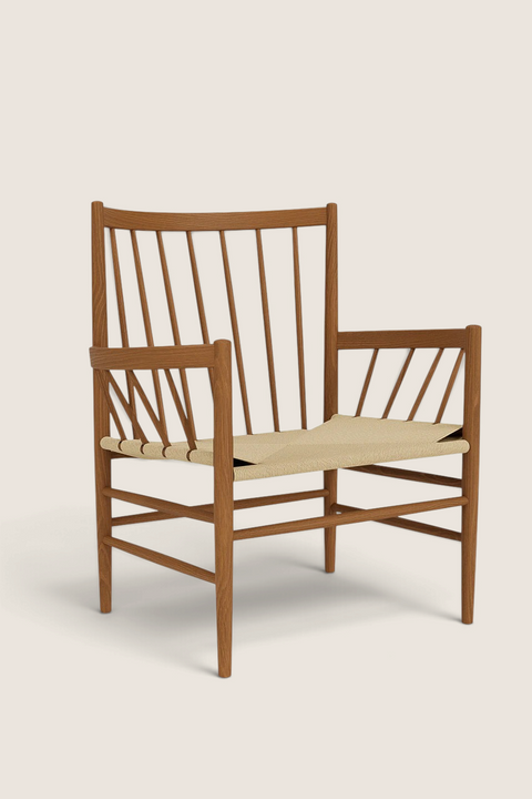 Bolina J82 lounge chair in smoked oak with a natural paper cord seat and high spindle backrest