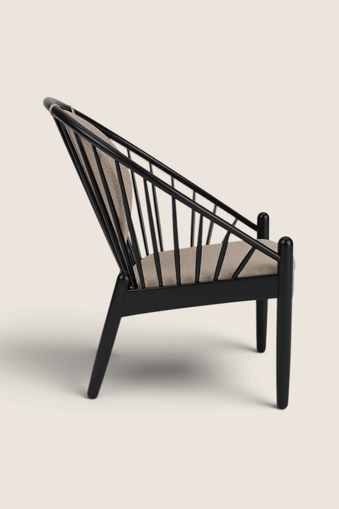 Bolina J166 Jørna lounge chair in black oak with beige upholstered seat and backrest, side view
