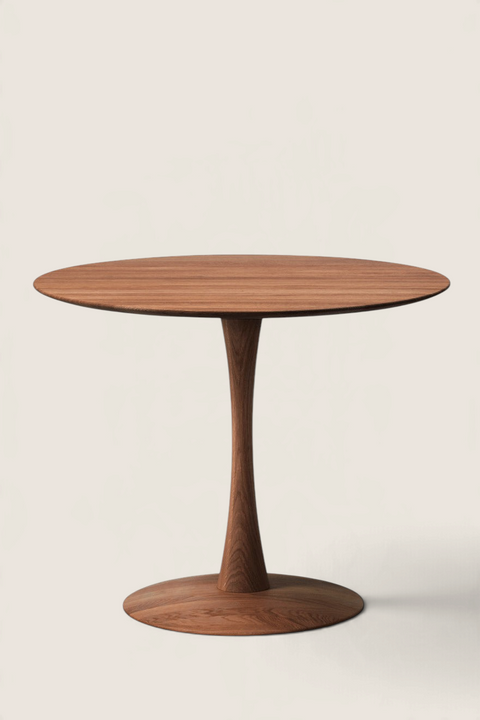 Bolina Trisse round dining table in smoked oak with a sculptural pedestal base, designed by Nanna Ditzel.