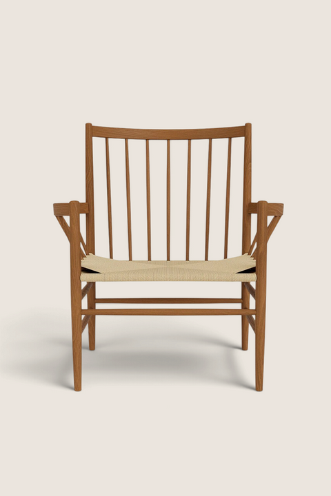 Bolina J82 lounge chair in smoked oak with a woven paper cord seat and high spindle backrest