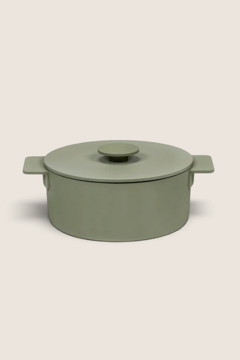 Bolina Serax Surface Pot M in camogreen cast iron with a matching lid and wide side handles on a white background.
