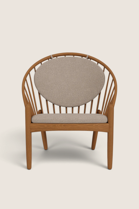 Bolina J166 Jørna lounge chair in smoked oak with beige upholstered cushions and iconic spindle back design
