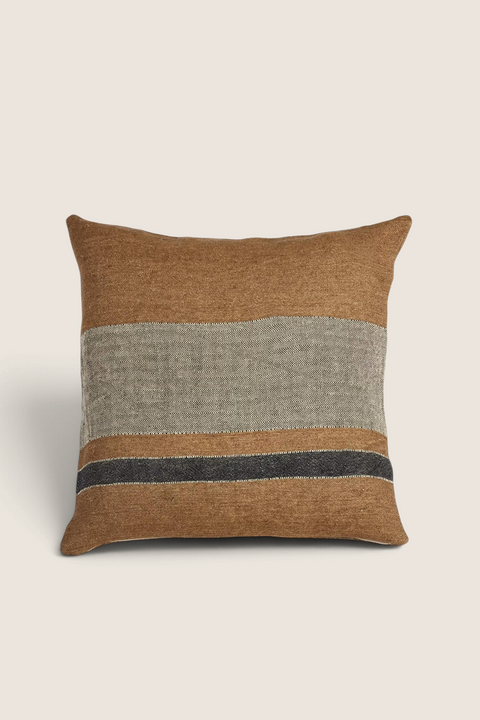 Bolina Libeco Nairobi linen pillow cover in warm brown with a light herringbone stripe and dark accent detail.