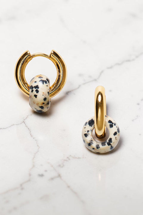 Bolina ANNI LU Glazed Donut gold hoop earrings featuring a round dalmatian stone charm with black spots