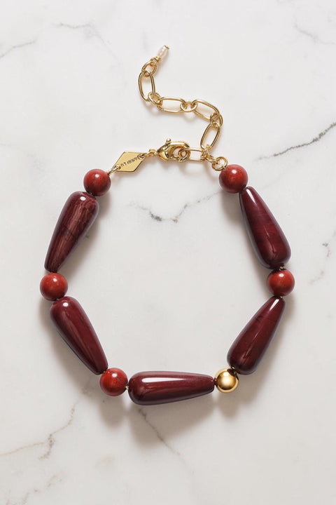Bolina ANNI LU Hot Drops bracelet featuring deep red jasper stones, round beads, and a gold-tone metal accent.