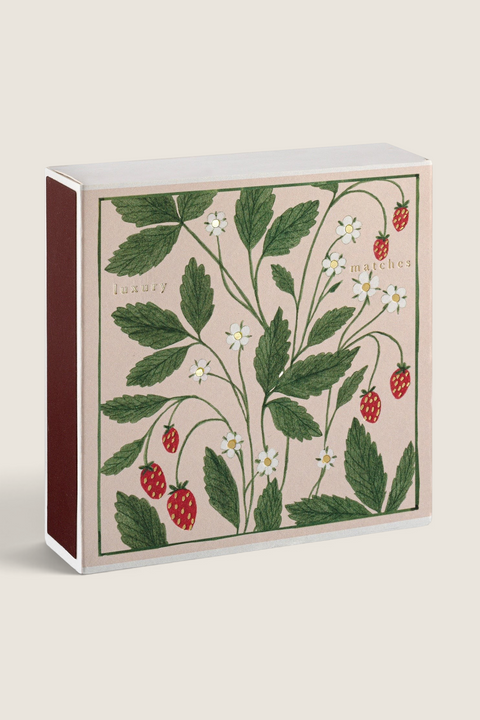 Bolina Archivist matchbox featuring a strawberry, leaf, and daisy illustration with gold foil accents.