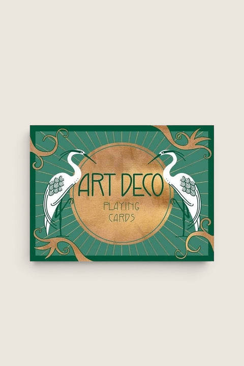 Bolina Art Deco playing cards in a green and gold decorative box featuring elegant heron illustrations.