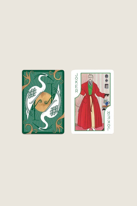 Bolina Art Deco playing cards featuring a green crane back design and a vintage George Barbier joker card illustration