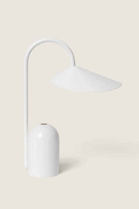 Bolina Arum portable white table lamp with a leaf-shaped shade and powder-coated iron and aluminum finish.