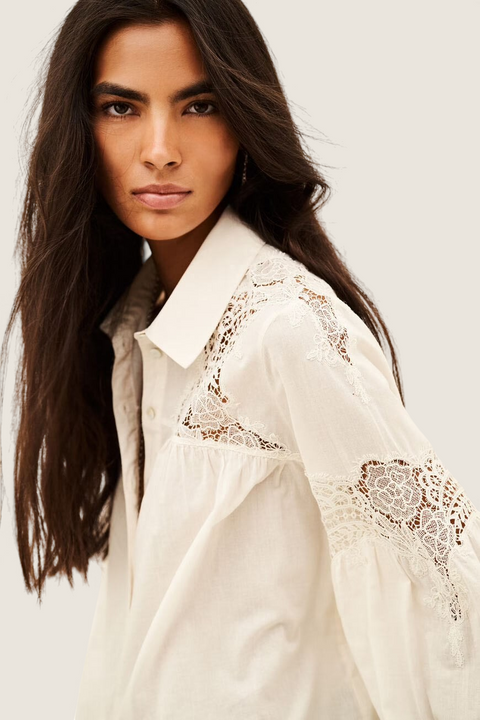 Bolina ba&sh Roseanne ecru cotton shirt with intricate lace inserts and puff sleeves worn by a model