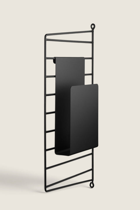 Bolina black metal magazine holder for String System shelving, featuring a minimalist wire frame design.