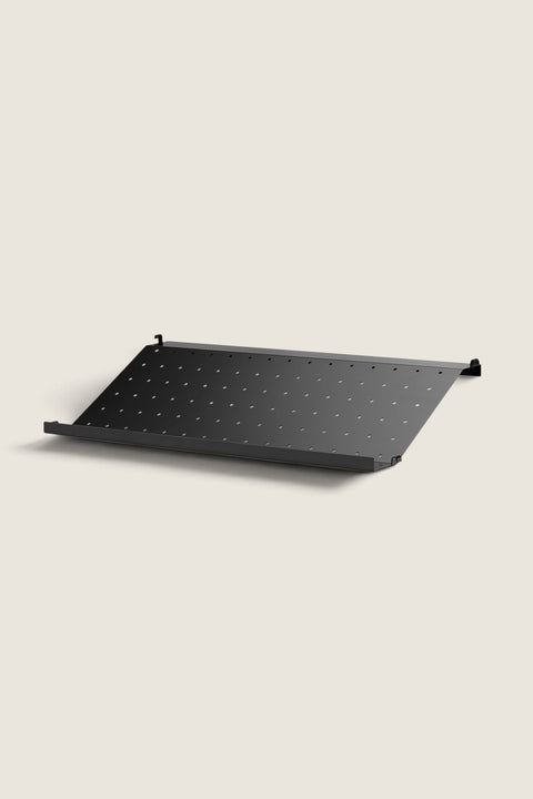 Bolina black metal shoe shelf for String System, 58cm wide with perforated design for organized entryway storage.