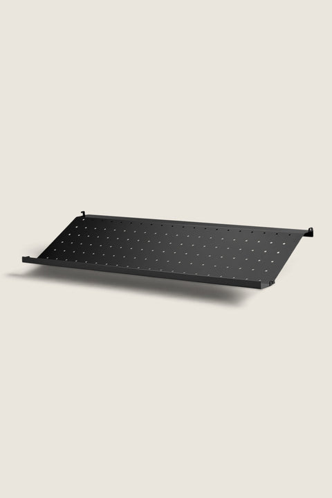 Bolina black metal shoe shelf for String System, 78x30 cm, featuring a perforated design for organized storage.