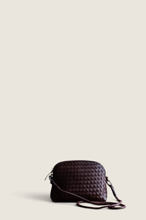 Bolina brown woven leather Chunky Fellini Pochette with a detachable shoulder strap and top zip closure.