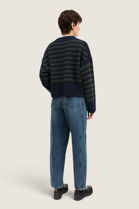 Bolina Campa jumper in navy and dark green striped merino wool with dropped shoulders and an oversized fit