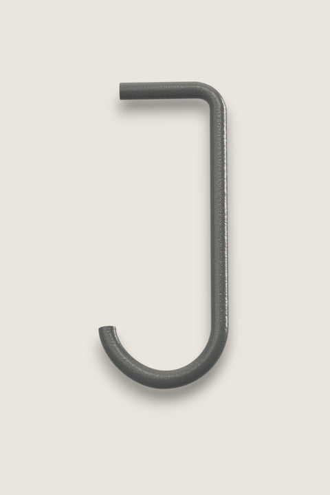 Bolina dark grey J-hook for String System metal shelves, designed for flexible storage and organization.