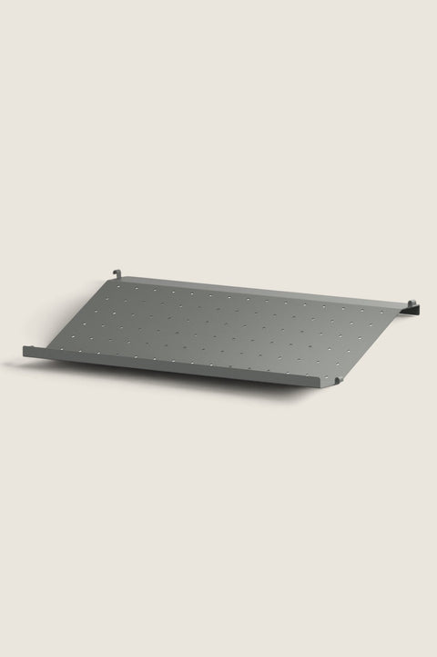 Bolina dark grey metal shoe shelf for String System, 58x30 cm, featuring a perforated design for organized storage.