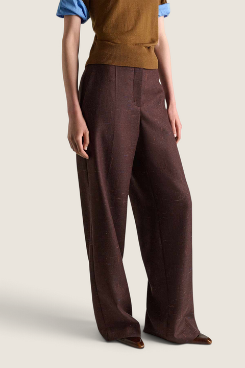 Bolina Dorothee Schumacher cinnamon tweed trousers with high waist, wide legs, and press folds on a model