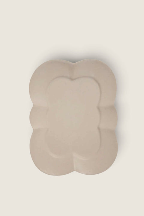 Bolina Fabian white stoneware serving dish with a soft, flower-like shape and thin profile.