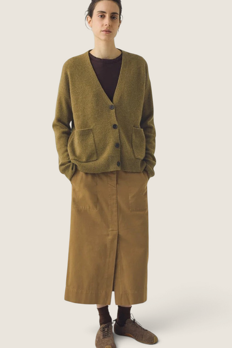 Bolina Ffion boxy cardigan in golden pear wool cashmere blend with V-neck and front pockets worn by a model