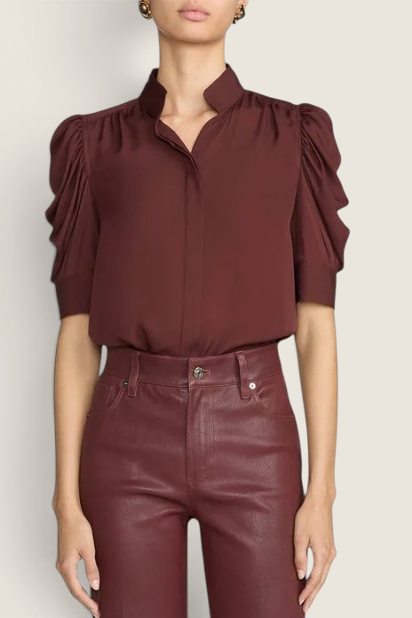 Bolina FRAME Gillian silk blouse in currant red with short puff sleeves and a soft collar worn by a model