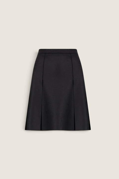 Bolina Harris Wharf London black A-line panel skirt in pressed wool with side pockets and raw edge detailing.