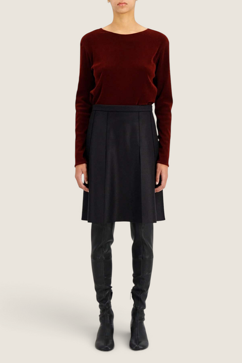Bolina Harris Wharf London black A-line panel skirt in pressed wool with side pockets and raw edge detailing