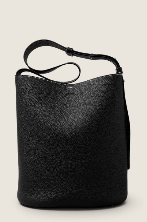Bolina LIÉ STUDIO Norma Tote in black textured leather with an adjustable shoulder strap and bucket bag silhouette.