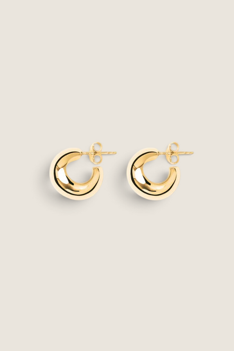 Bolina LIÉ STUDIO The Simone gold hoop earrings with a polished, rounded, and chunky design.