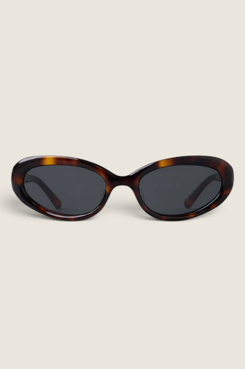 Bolina LIÉ STUDIO Robyn sunglasses in dark tortoise shell with a narrow cat-eye frame and rounded edges.