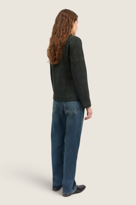 Bolina Mabel green check wool jacket with a round neck and slim fit worn by a model with long hair from the back