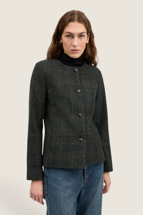 Bolina Mabel wool jacket in dark green check with round neck and front button closure worn by a model