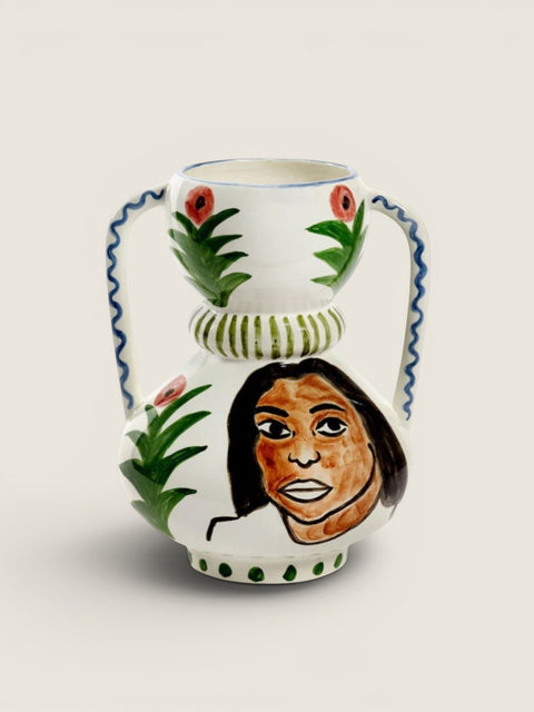 Bolina Santiago de Borja Mamey Mix vase with hand-painted portrait and floral motifs. Ceramic with organic shapes.