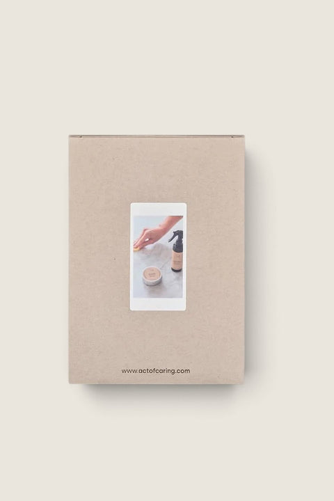 Bolina marble and fine stone care kit in a minimalist cardboard box with product application photo on the front