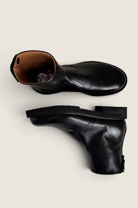 Bolina Megan short boots in Bufera black leather with a sturdy rubber sole and back zipper closure.