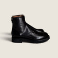 Bolina Megan short boots in Bufera black leather with a sturdy rubber sole and back zipper closure.