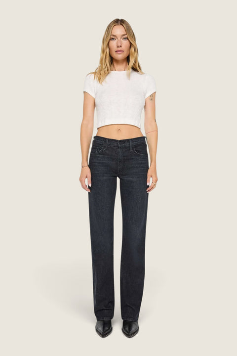 Bolina model wearing black MOTHER The Reifler Starry-Eyed jeans with a relaxed straight-leg fit and mid-rise waist.