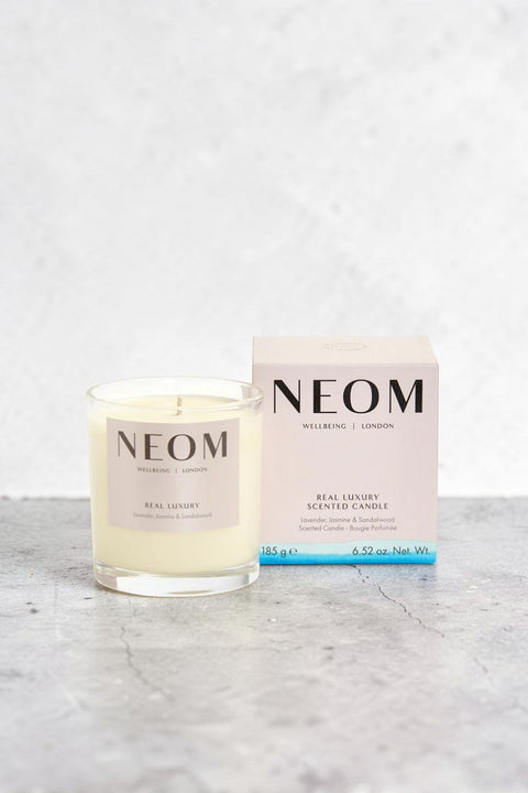 Bolina Neom Real Luxury scented candle in glass jar with lavender, jasmine, and sandalwood scent. 185g.