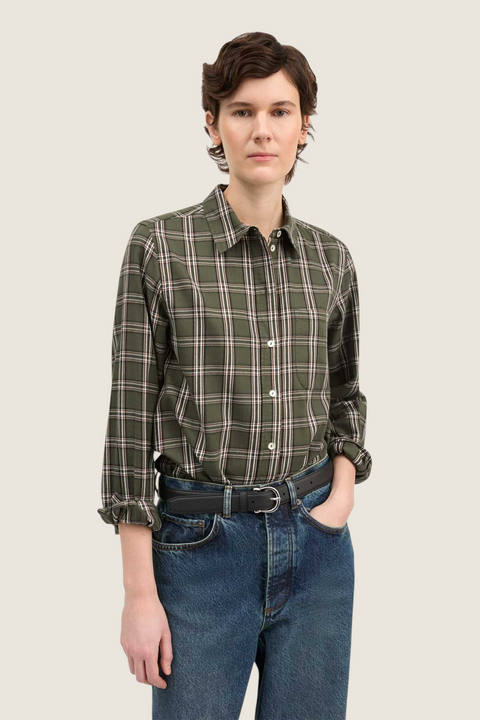 Bolina Nico shirt in green and white check pattern with long sleeves, collar, and chest pocket worn with blue jeans