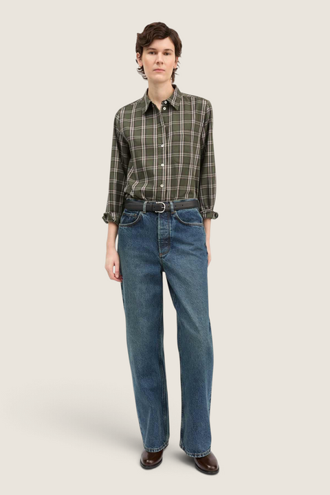 Model wearing a Bolina green and white checkered Nico shirt with a collar, button front, and chest pocket.