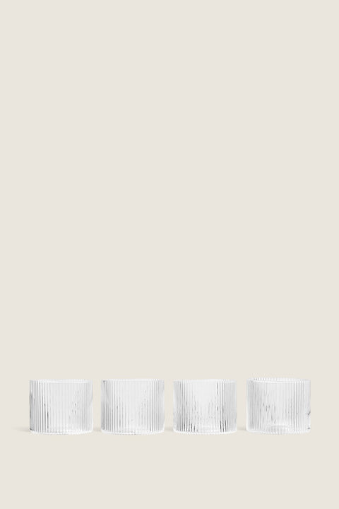 Bolina set of four clear mouth-blown Ripple low glasses with vertical ribbed texture in a minimalist design