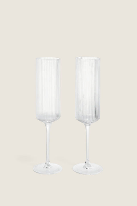 Bolina set of two clear mouth-blown glass champagne flutes with a distinctive vertical ribbed texture