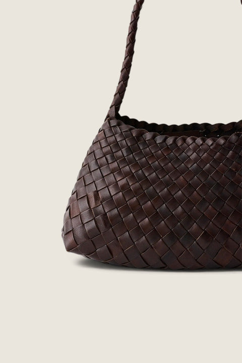 Bolina Rosanna dark brown woven leather handbag with a braided shoulder strap and textured basketweave pattern.