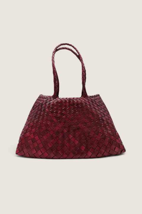 Bolina Santa Croce Big hand-woven bordeaux leather tote bag with braided handles and a sophisticated open-top design.