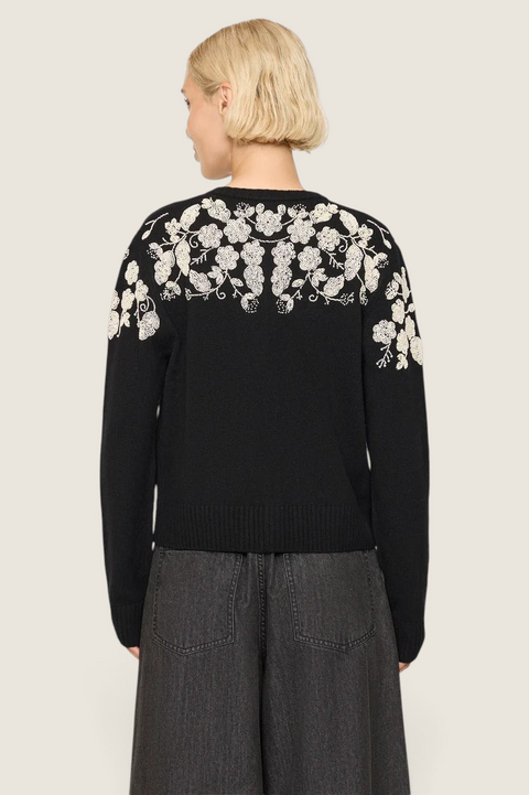 Bolina Shiloh black wool cardigan featuring intricate white floral bead embroidery on the shoulders and back