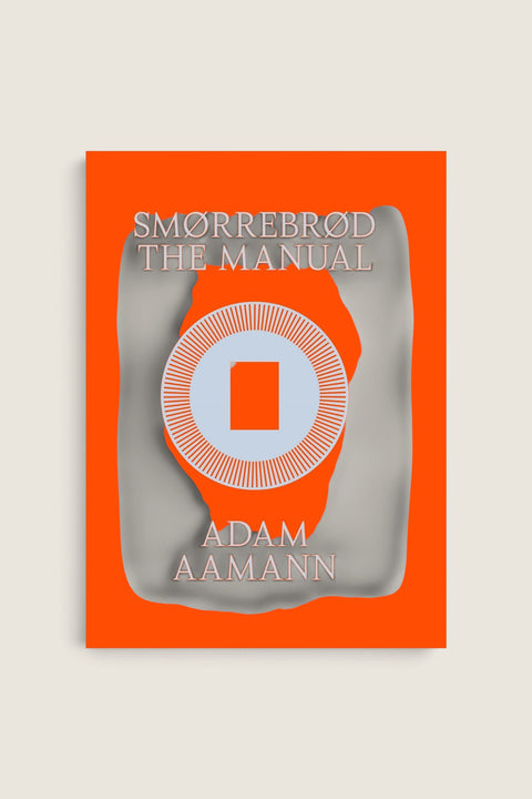 Bolina Smørrebrød The Manual cookbook by Adam Aamann featuring a vibrant orange cover with modern graphic design