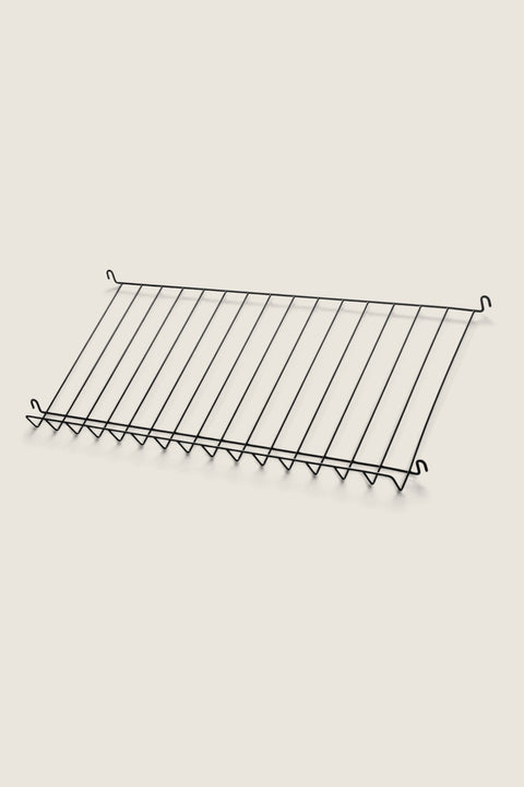 Bolina String System black powder-coated steel magazine shelf for displaying books and magazines